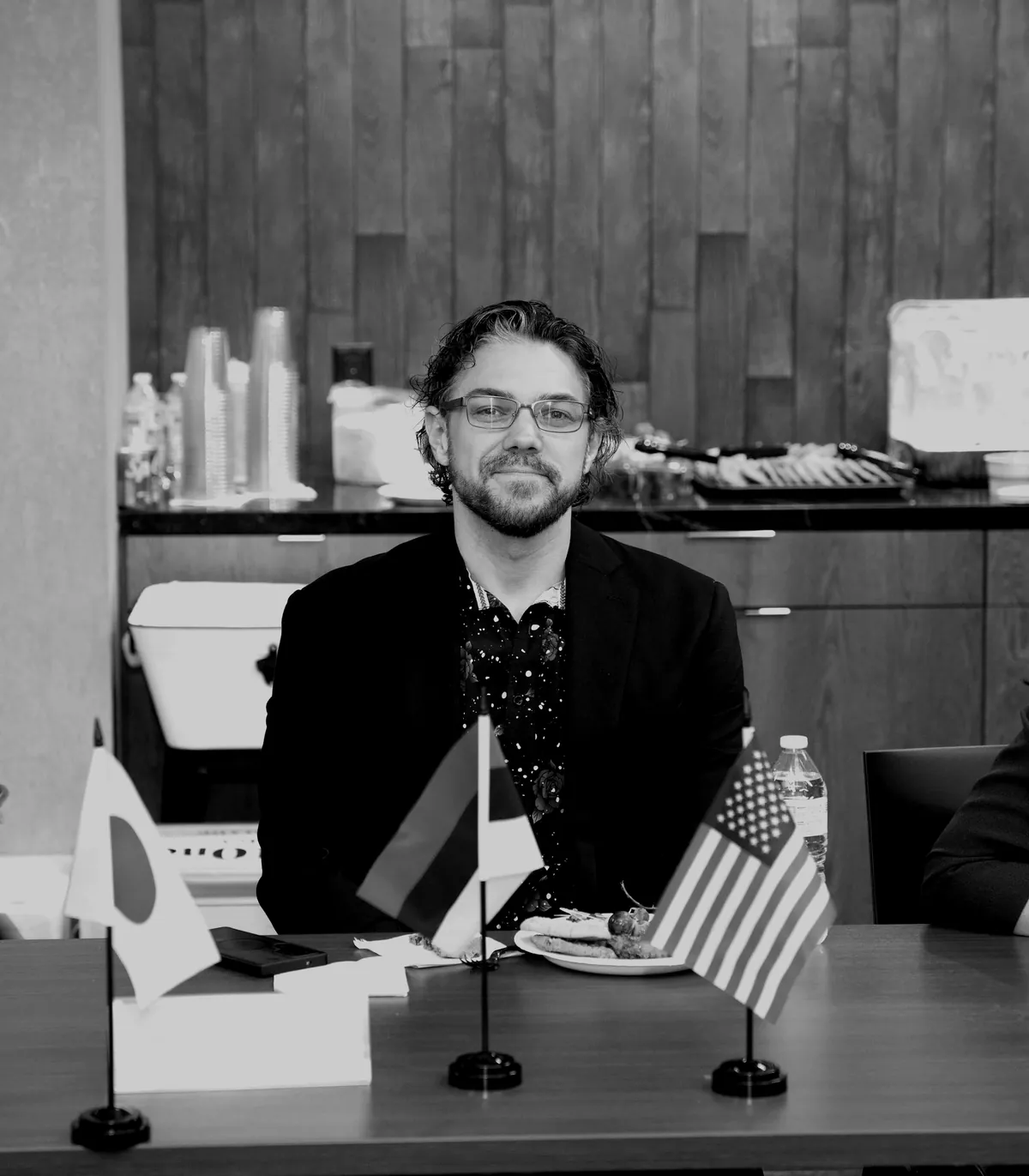 Michael Griswold at a boardroom table in Houston